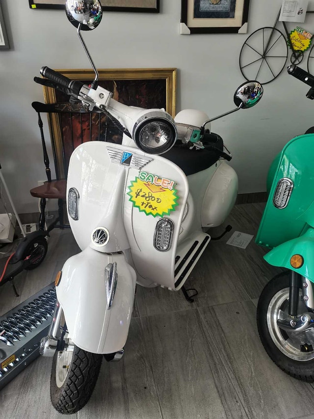 beautiful retro ebike VESPA white,styling,all electric, no gas
