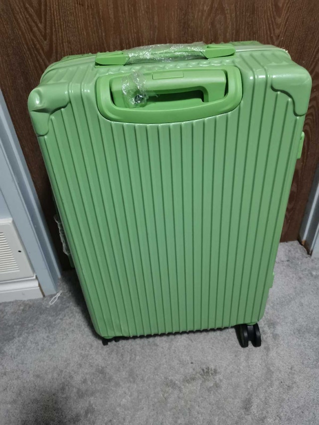 like new green luggage 26" - photo 2