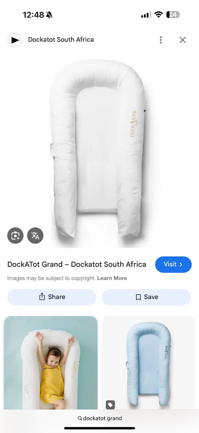Selling Dockatot grand with floral cover