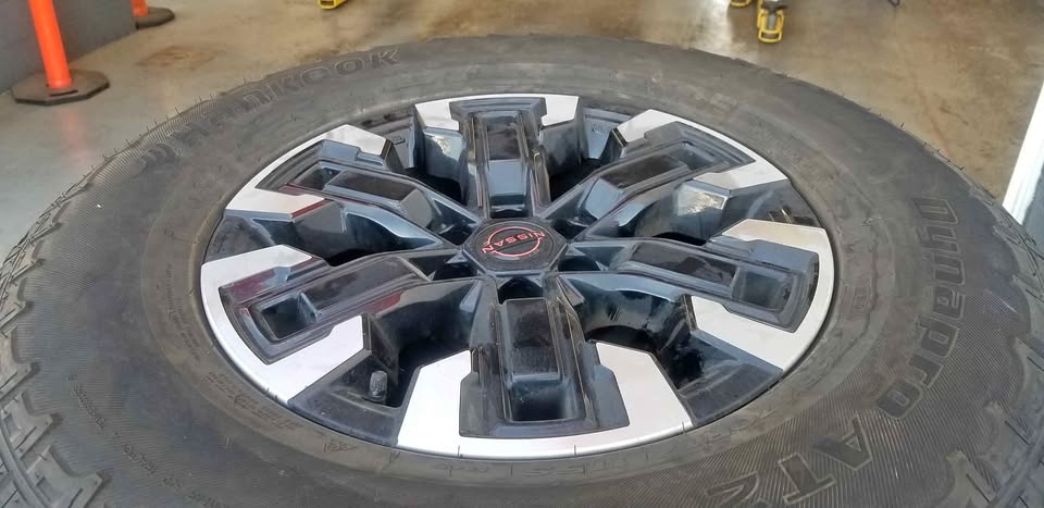 Nissan OEM Rims + Hankook Dynapro AT2 All-Terrain Tires