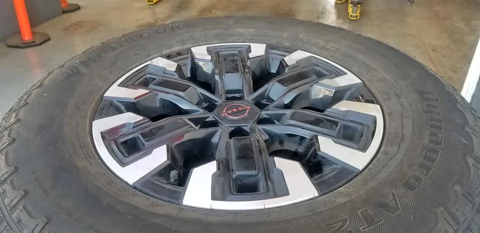 Nissan OEM Rims + Hankook Dynapro AT2 All-Terrain Tires