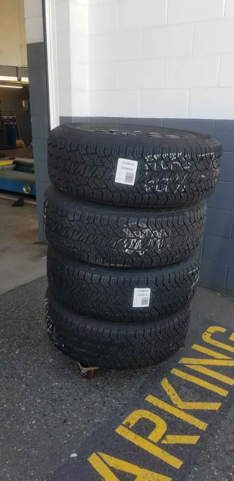 Nissan OEM Rims + Hankook Dynapro AT2 All-Terrain Tires image indicator(2)