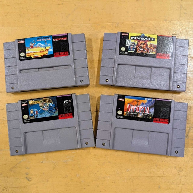 SNES Games: Road Runner, Pinball, Ultima, Utopia