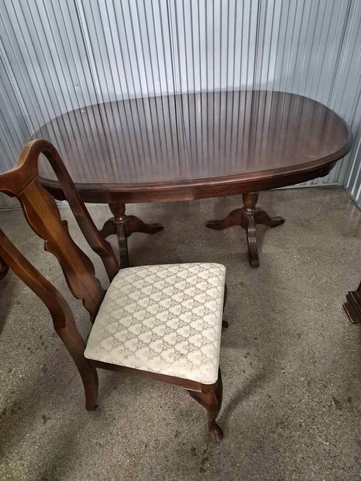 Solid wood dining table with six matching chairs for sale