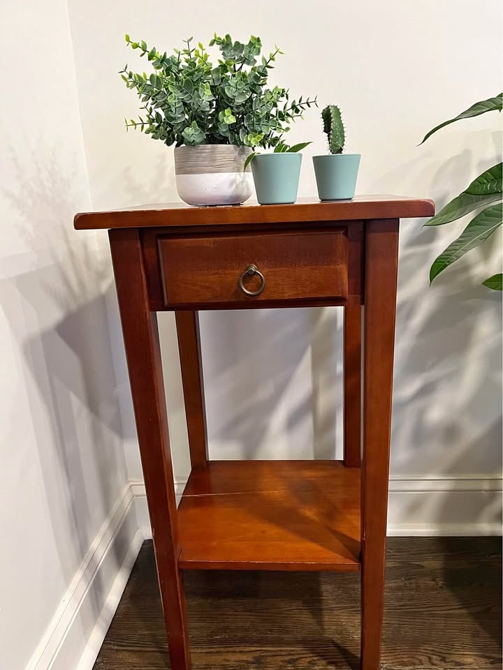 2-Tier solid wood plant table with drawer.