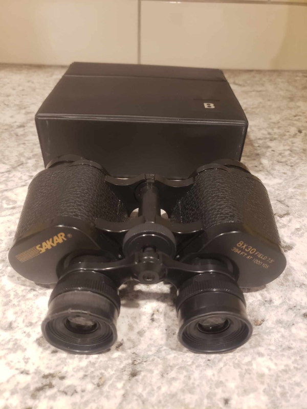 Sakar binoculars 8 X 3 Field 7.5” 394 Ft. 1000 Yds.