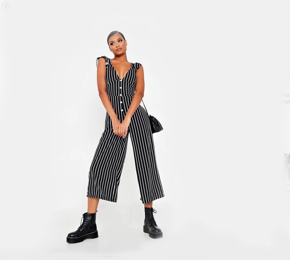 Black striped ruffle shoulder button up jumpsuit small