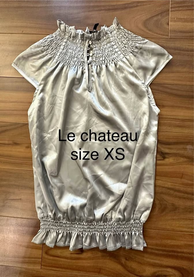 Never worn Le Chateau & Gap Blouses Price : $10 each