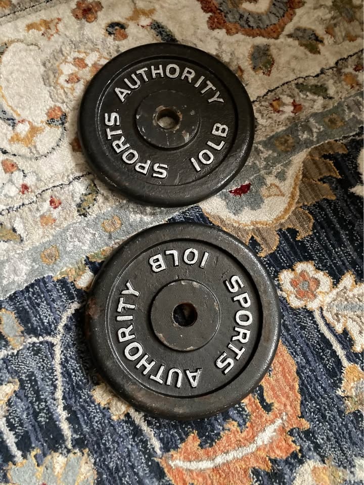 70 lbs of weight plates - photo 2