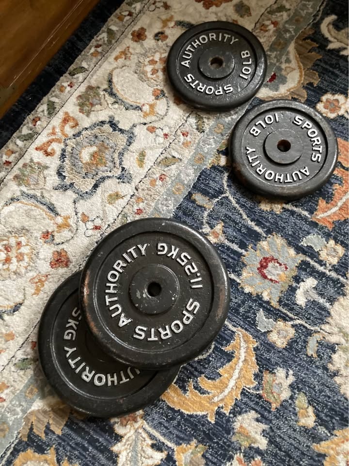 70 lbs of weight plates - photo 3