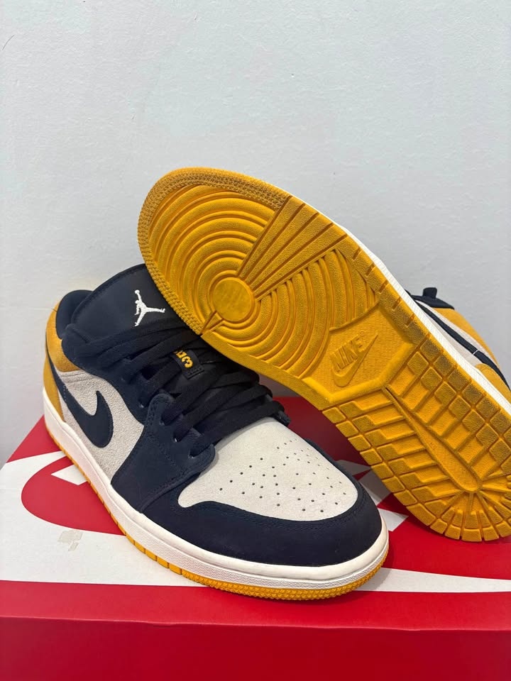 Jordan 1 Low University Gold
