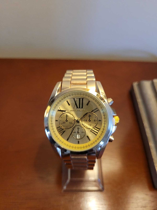 Brand New Women's Gold Watch with Chronograph Roman Dial