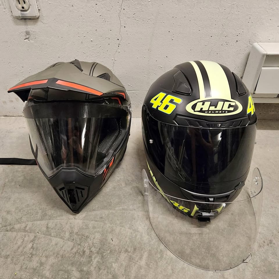 Two motorcycle helmets (XS and Medium)