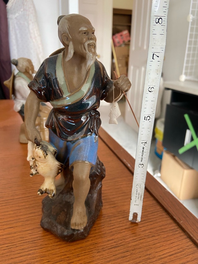 Fisherman Statue
