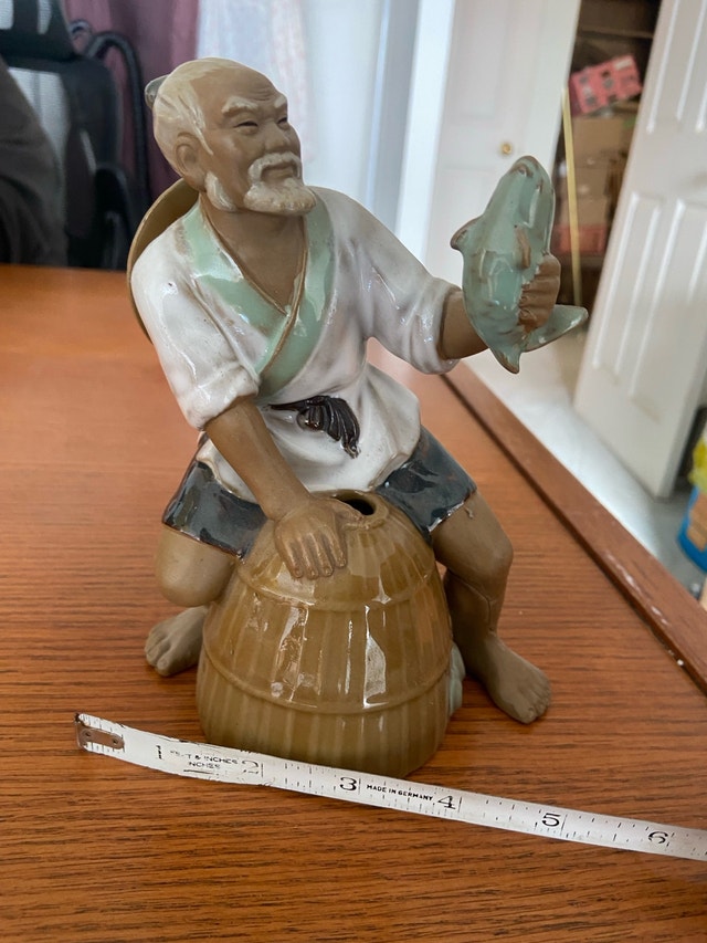 Ceramic Fisherman Statue