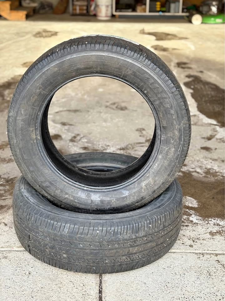 (2) Bridgestone 235/60R18 All Season Tires