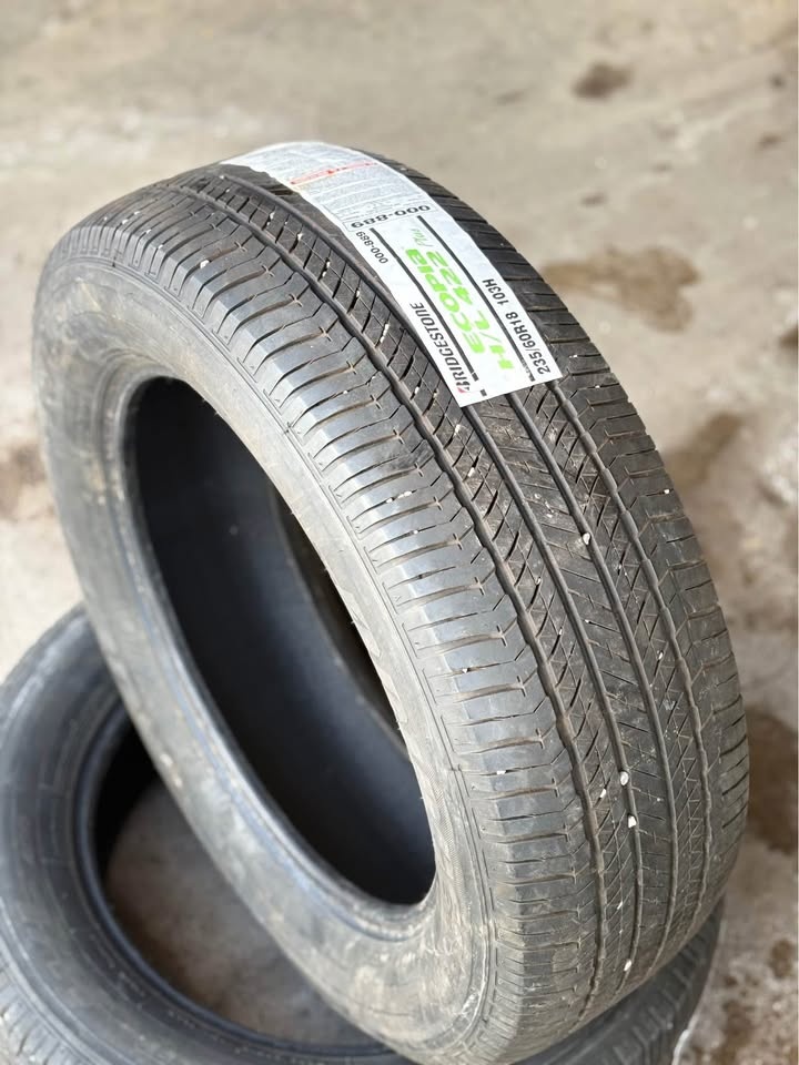 (2) Bridgestone 235/60R18 All Season Tires - photo 2