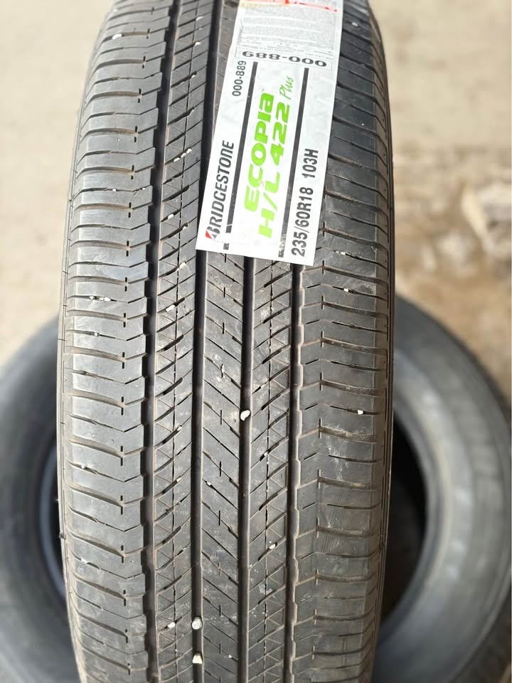 (2) Bridgestone 235/60R18 All Season Tires - photo 3