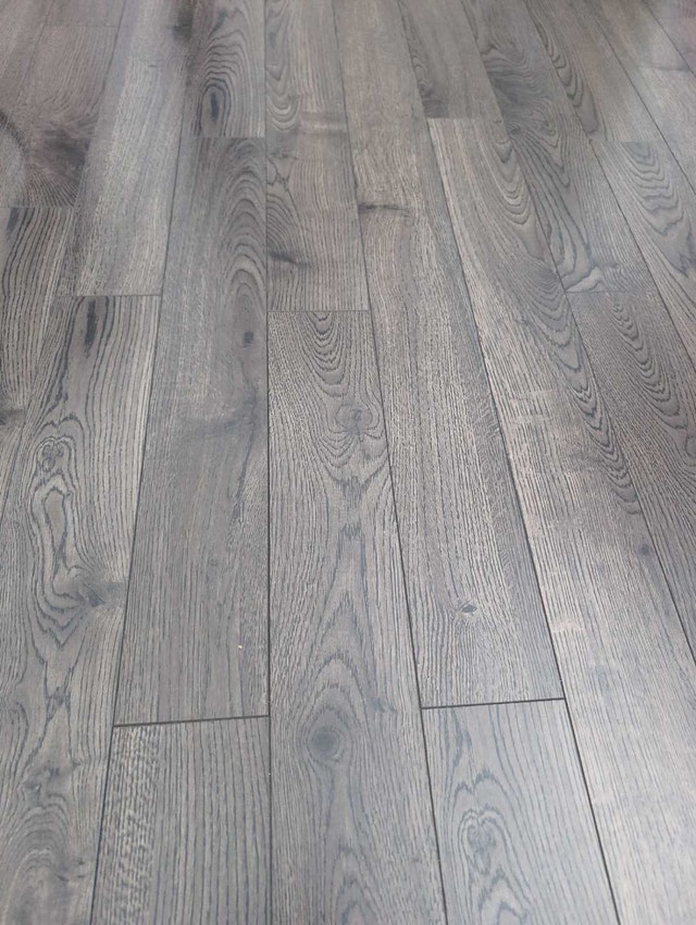 80 sqft of 15.3mm laminate flooring. brand new in box.