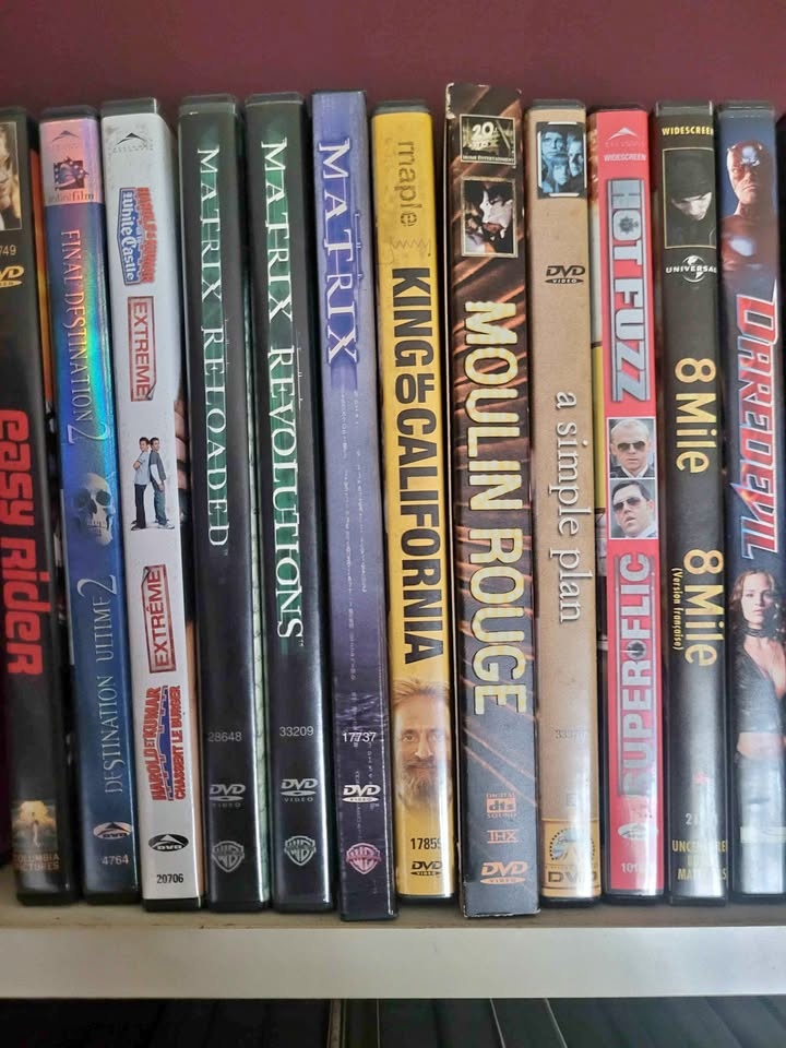 $1 per DVD $2 per Blu-ray