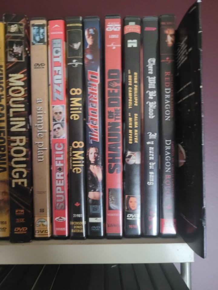 $1 per DVD $2 per Blu-ray - photo 2