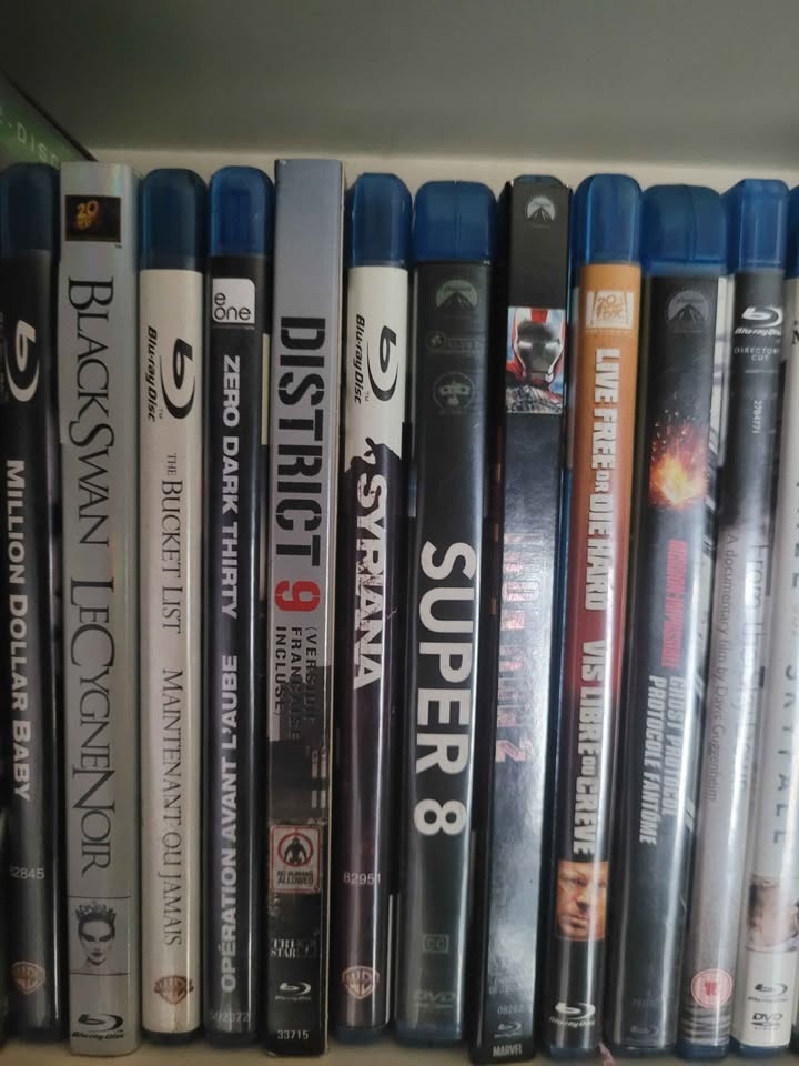 $1 per DVD $2 per Blu-ray - photo 3