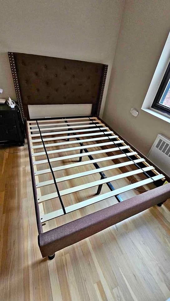A stylish Full size Upholstered Bed - Used (Like New)