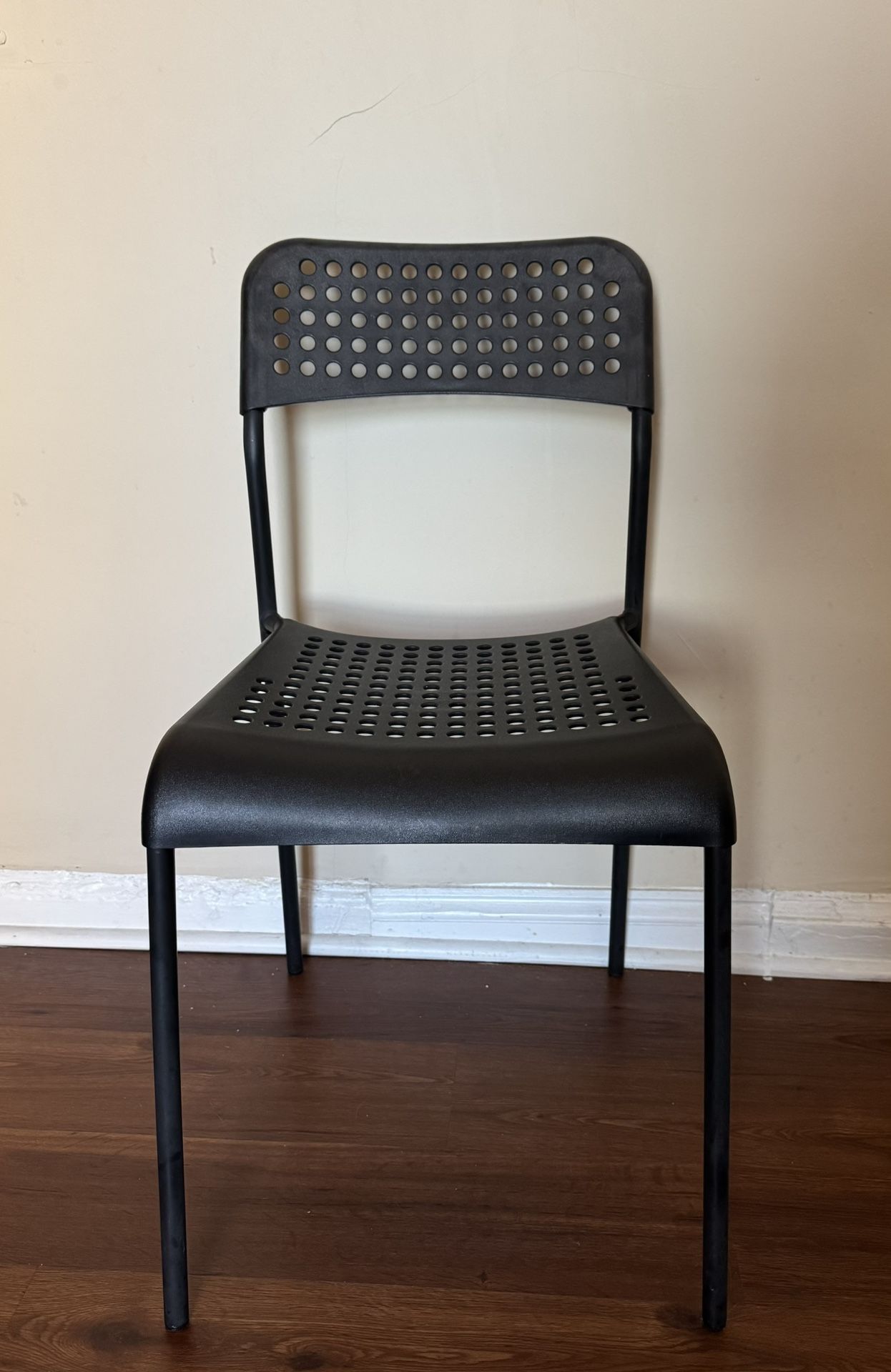 4 Black IKEA Dining Chairs – Stackable & Lightweight