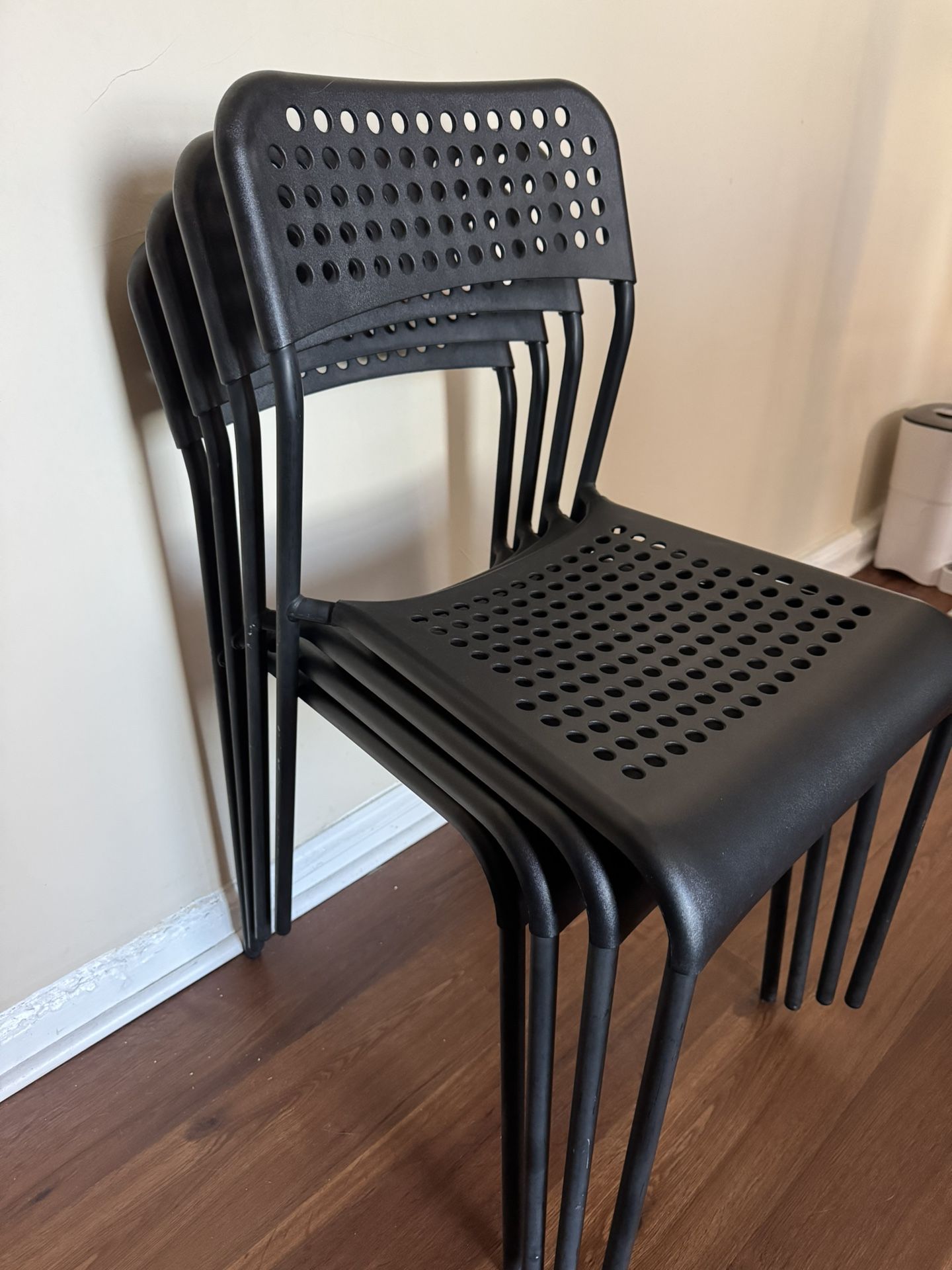 4 Black IKEA Dining Chairs – Stackable & Lightweight - photo 2