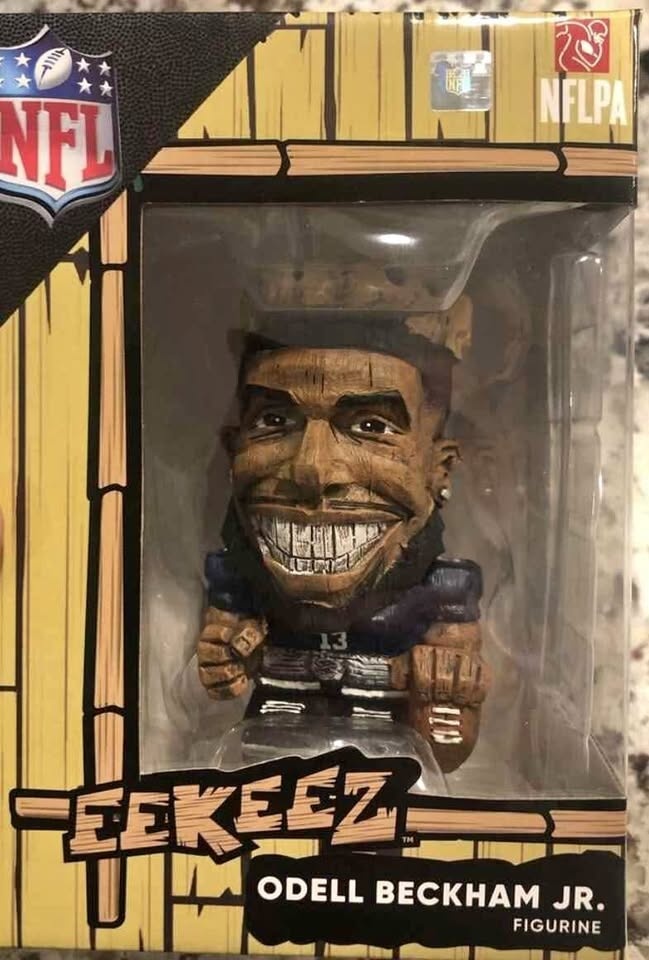 Eekeez Beckham Jr carved figurine