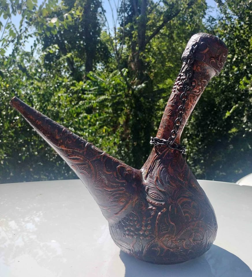 Embossed leather wrapped glass wine decanter