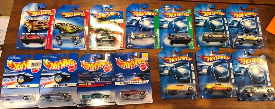 Various Packaged Hotwheels, and a few other loose items