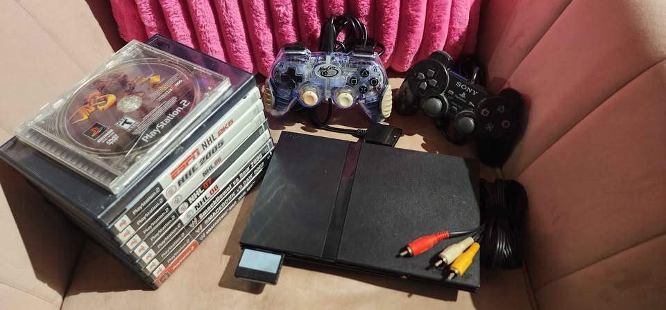 PS2 Slim Bundle – 10 Games (SmackDown & Jak 3)