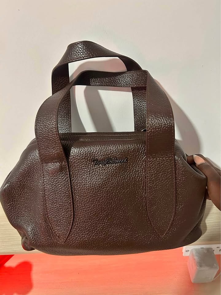 Brown animal skin clutch bag