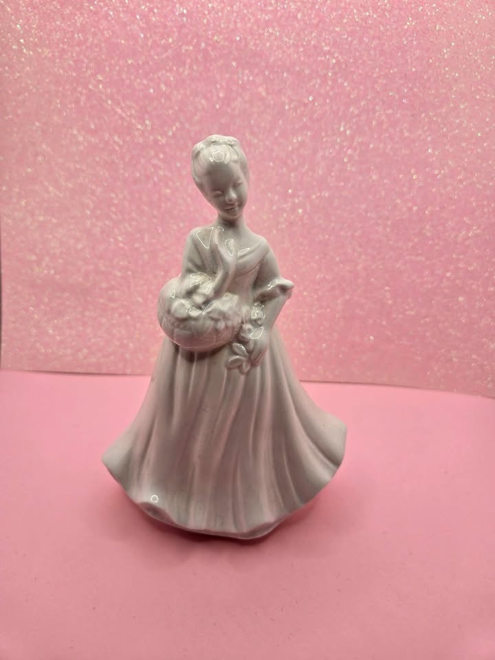 Vintage White Figurine of Woman Holding Flowers