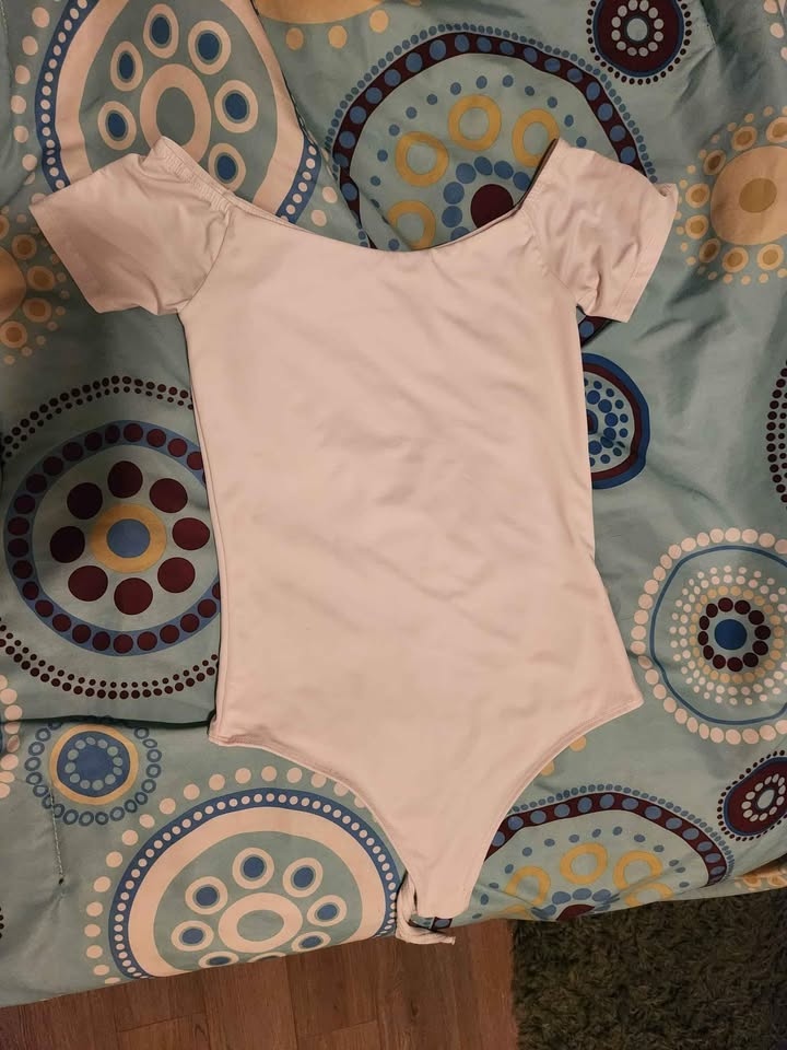 Body Suits Small ($10 each)