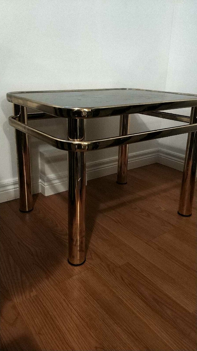 Two Brass and glass table set