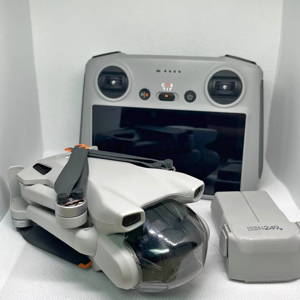 DJI Mini 3 Drone + RC Controller + Bag