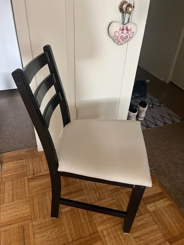 Ikea black and white wooden chairs