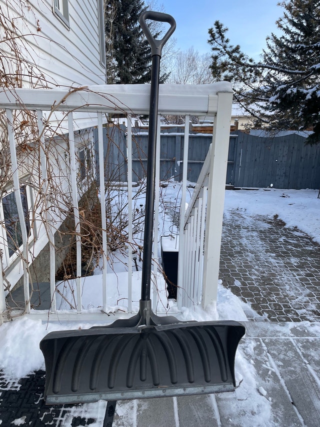 Plastic snow shovel