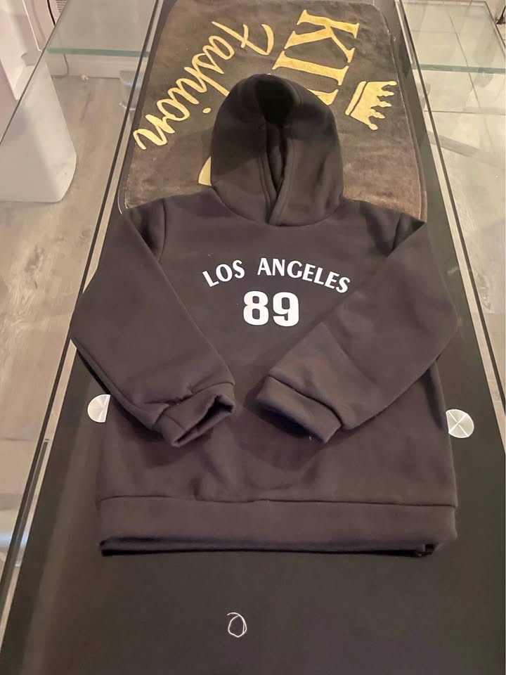 Boy’s stylish hooded sweater