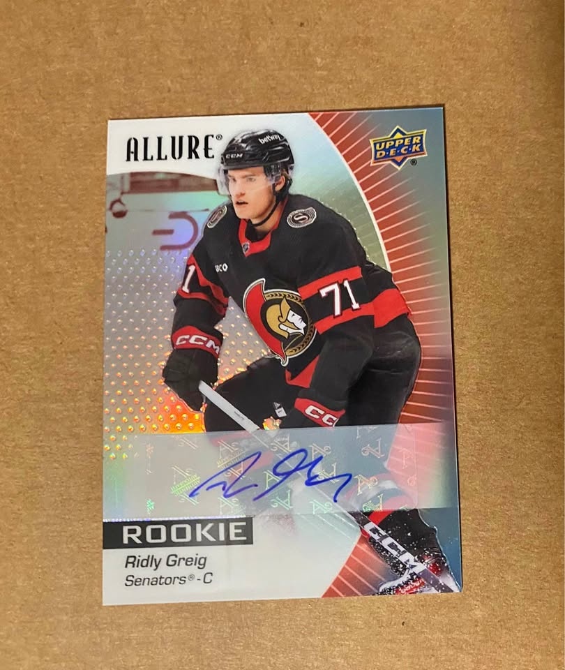 2023-24 Allure Ridly Greig Red Rainbow Auto Rookie - Ottawa Sena