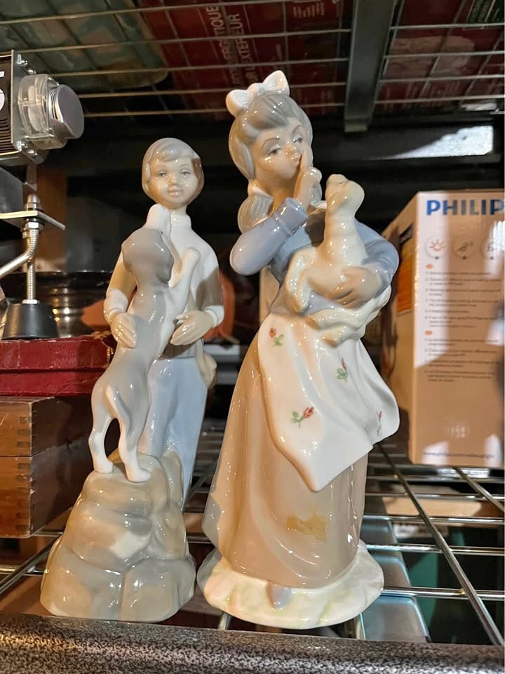 Mary had a little lamb statue with boy/dog statue