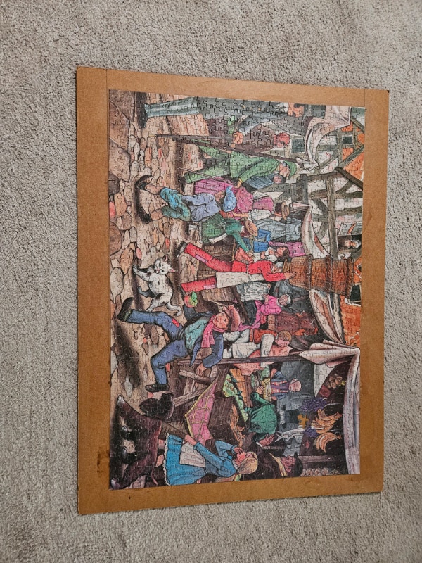 2 Completed 1000-Piece Puzzles: Alpine Chapel & European Market