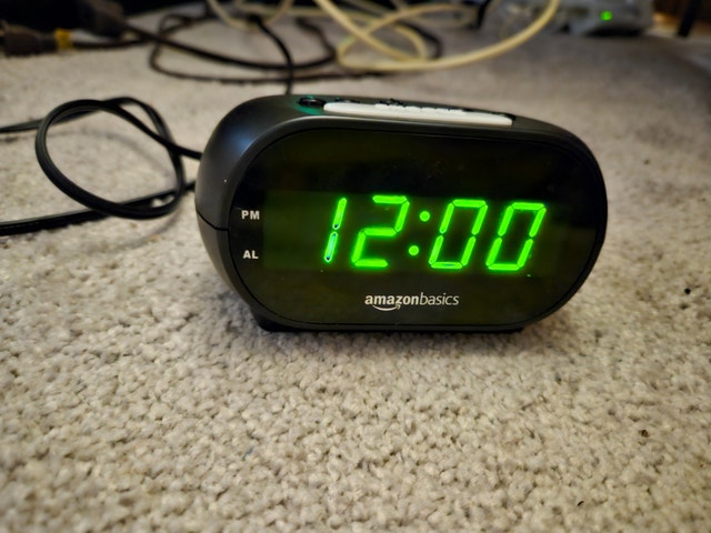 Amazon Basics Digital Alarm Clock, Night Light & Battery Backup