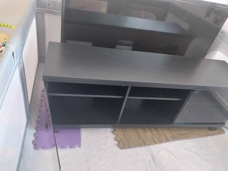 Moving Sale: 65 inch tv stand - photo 2