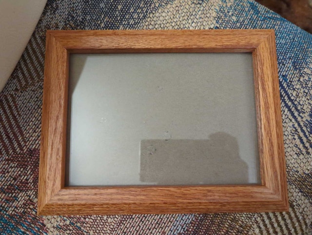 Four wooden picture frames