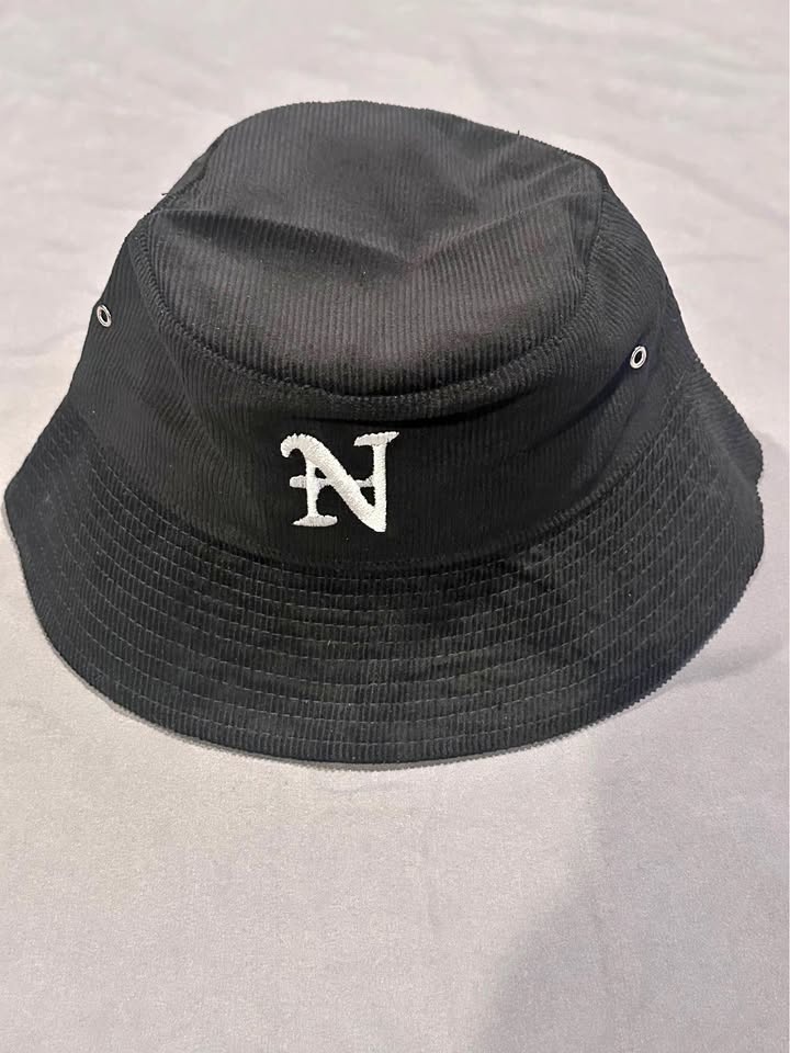 Nahmias corduroy bucket hat with embroidered 'N' logo