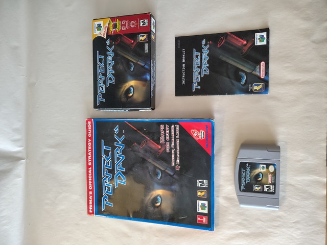 Perfect Dark w/ Box, Manual & Strategy guide. N64, tested works