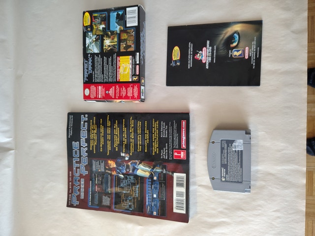 Perfect Dark w/ Box, Manual & Strategy guide. N64, tested works - photo 2